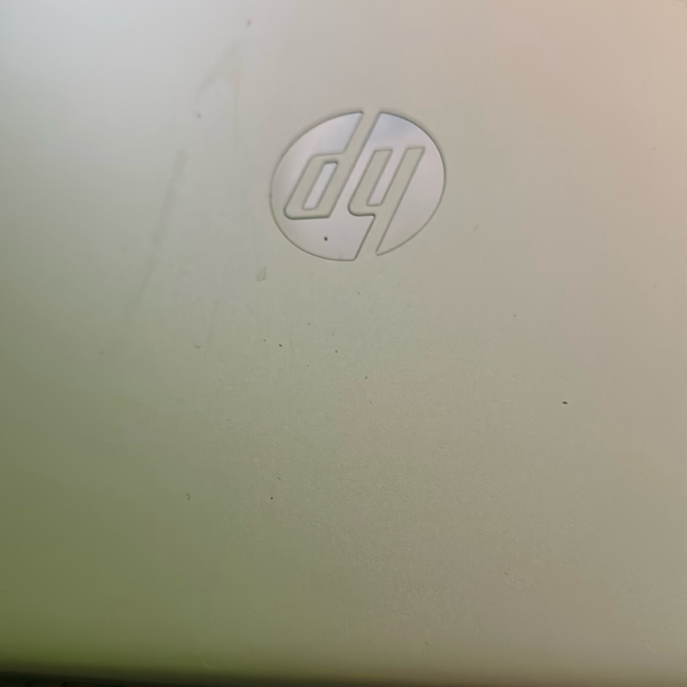 it works great color is silver it comes with a charger and a hp laptop model 15